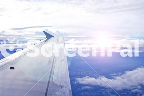 View Of Jet Plane Wing With Cloud Patterns